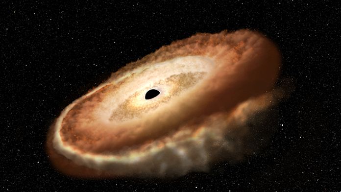 Gli astronomi individuano un buco nero che trasforma una stella a forma di ciambella a 300 milioni di anni luce di distanza