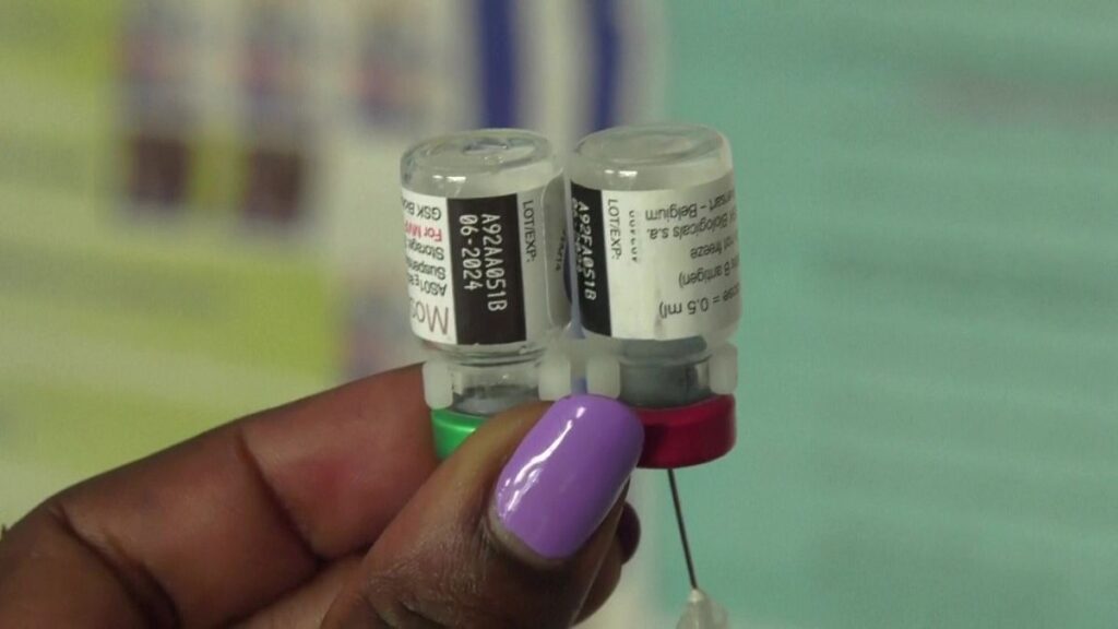 Nurse preparing a jab - RTS,S malaria vaccination