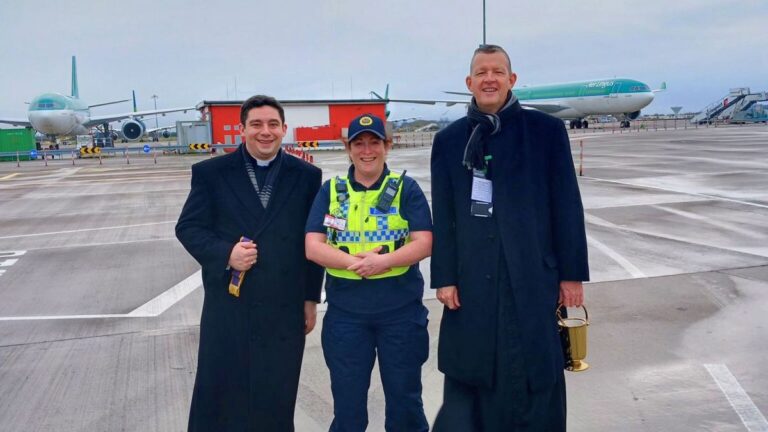 Father Des Doyle carrying out the annual blessing of the planes on 25 December 2023.