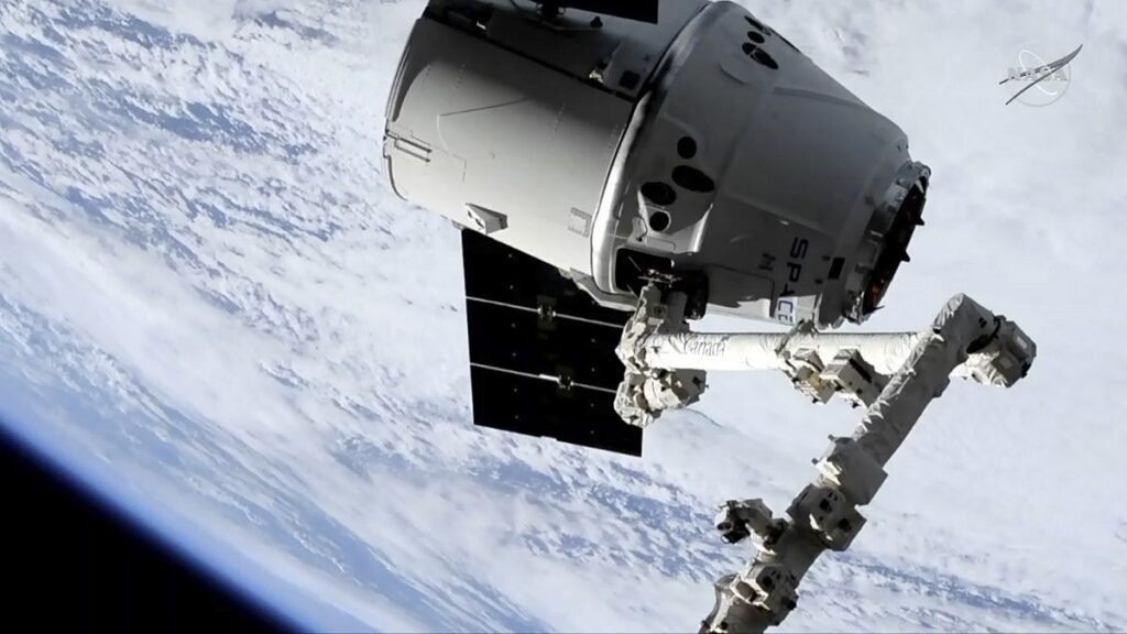 In this image taken from NASA Television, a SpaceX shipment prepares to arrive at the International Space Station following a weekend launch, Monday, May 6, 2019.