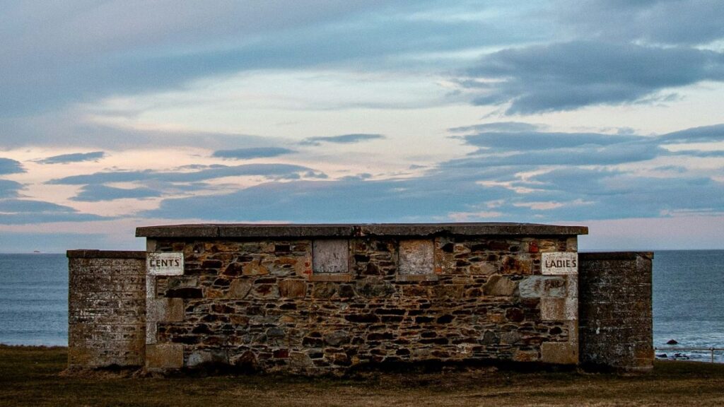 Public toilets near a beach.