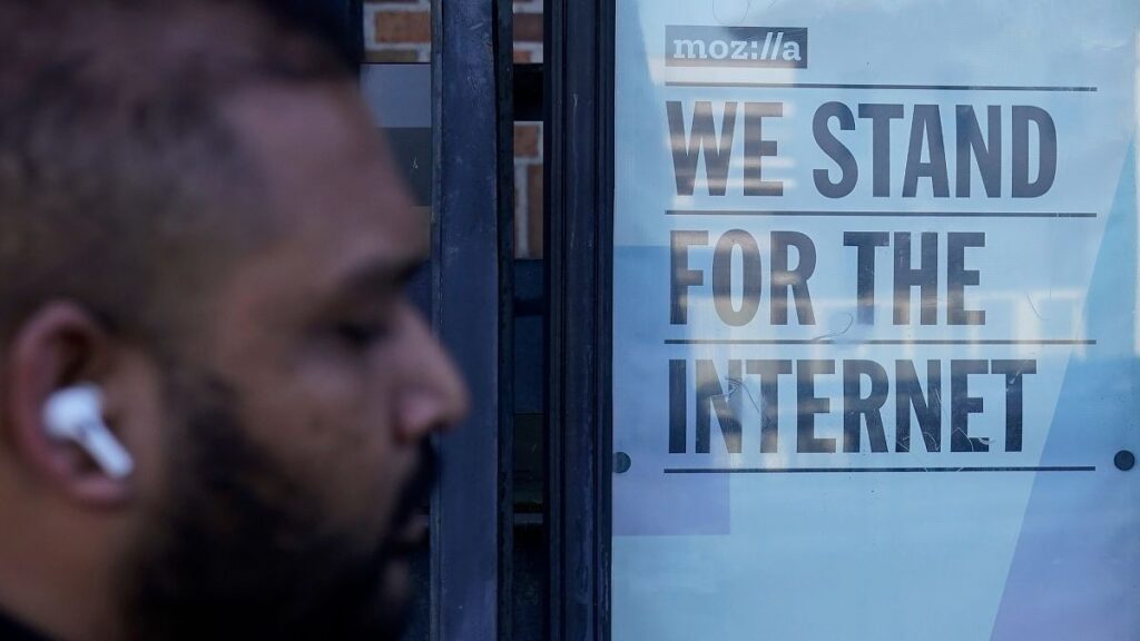 A pedestrian walks past a sign outside of a Mozilla office in San Francisco, Wednesday, April 12, 2023.