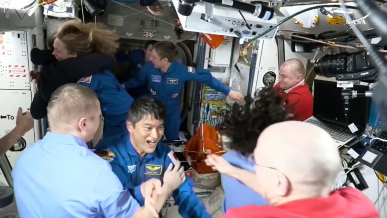 Astronaut Takuya Onishi, center, greeting each other after the SpaceX capsule docked with the International Space Station, March 16th 2025