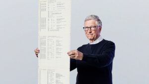 This recent photo provided by Gates Ventures shows Microsoft founder Bill Gates holding a printout of the computer coding that launched the software maker in April 1975.