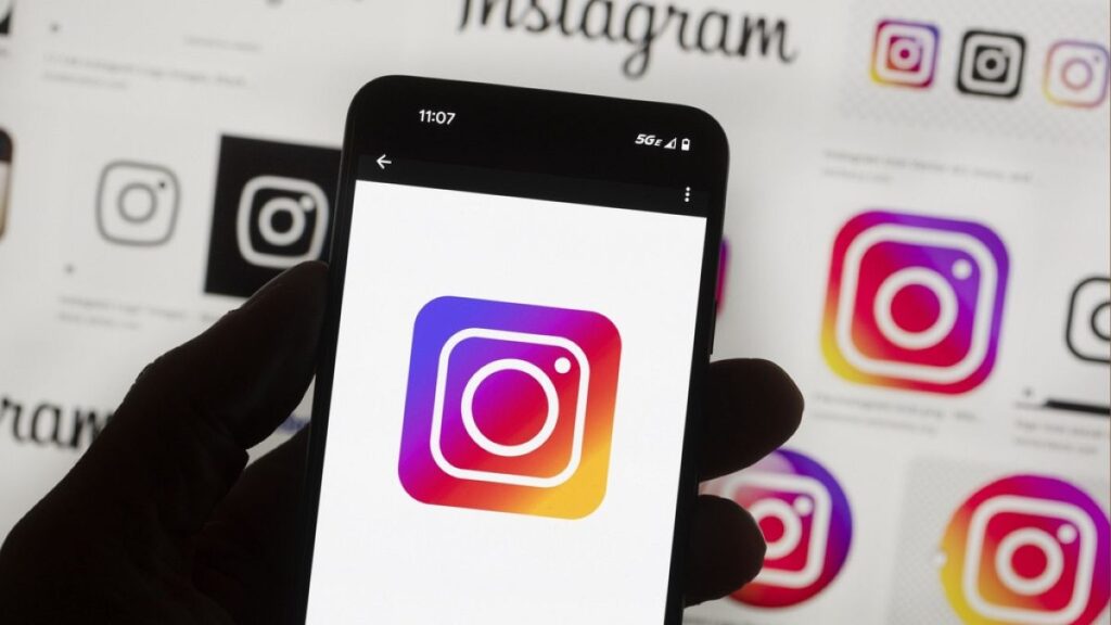 File - The Instagram logo is seen on a cell phone, Friday, Oct. 14, 2022, in Boston.