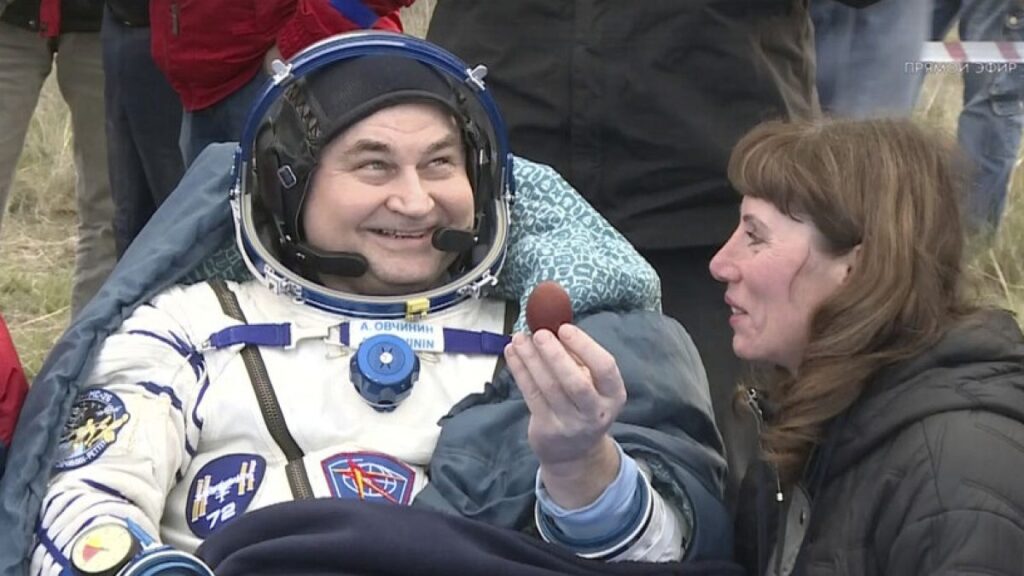 Roscosmos cosmonaut Alexey Ovchinin holds traditional Easter painted egg shortly after the landing of the Russian Soyuz MS-26 space capsule, Kazakhstan, Sunday, April 20, 2025